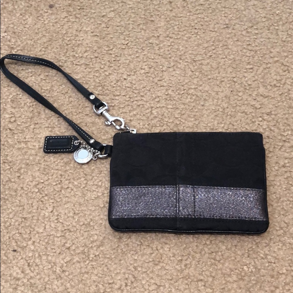 Beautiful small coach wristlet/ black with silver